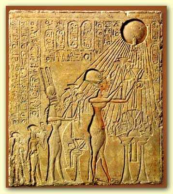 Pharaoh Akhenaten (center) and his family adoring the Aten, with characteristic rays seen emanating from the solar disk. The next figure leftmost is Meritaten, the daughter of Akhenaten, adorned in a double- feather crown.