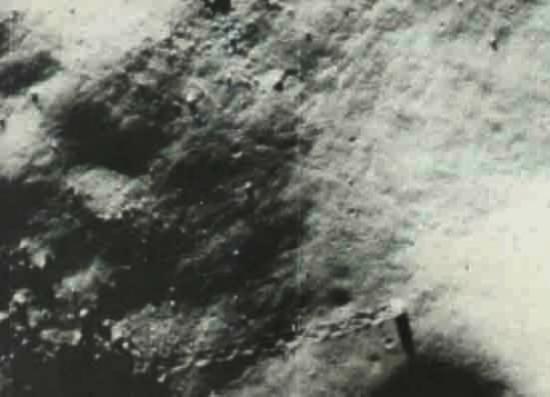 One of the many images of the moon showing objects and paths NOT MADE by man-made vehicles.