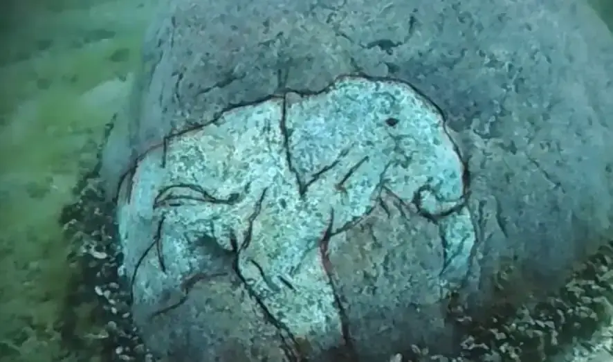 Researchers find a rock with a carving of a Mastodon at the underwater Stonehenge of Lake Michigan