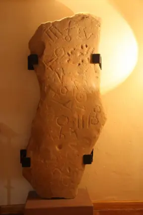 Mystery ancient Stone Slab—engraved with strange symbols no one can read, baffles experts