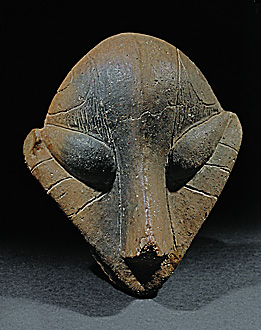 Small mask, terracotta. From Predionica, Kosovo. Vinca-Plocnik Culture, Late Mesolithic (5th mill. BCE). Height 16 cm Inv. 158