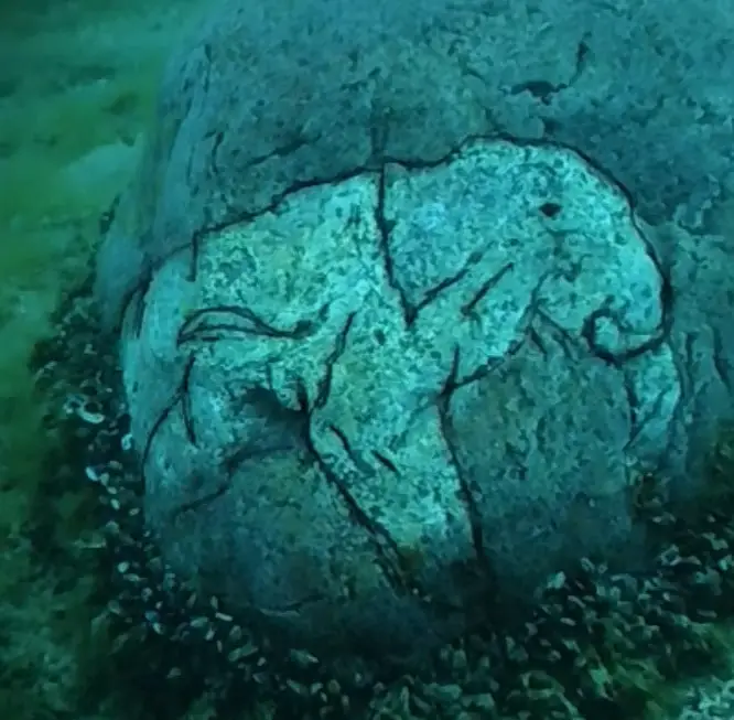 Image - Researchers find a rock with a carving of a Mastodon at the underwater Stonehenge of Lake Michigan