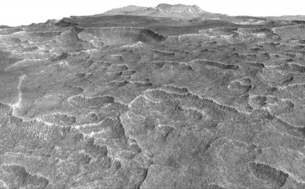 This vertically exaggerated view shows scalloped depressions in a part of Mars where such textures prompted researchers to check for buried ice, using ground-penetrating radar aboard NASA's Mars Reconnaissance Orbiter. They found about as much frozen water as the volume of Lake Superior. Credits: NASA/JPL-Caltech/Univ. of Arizona