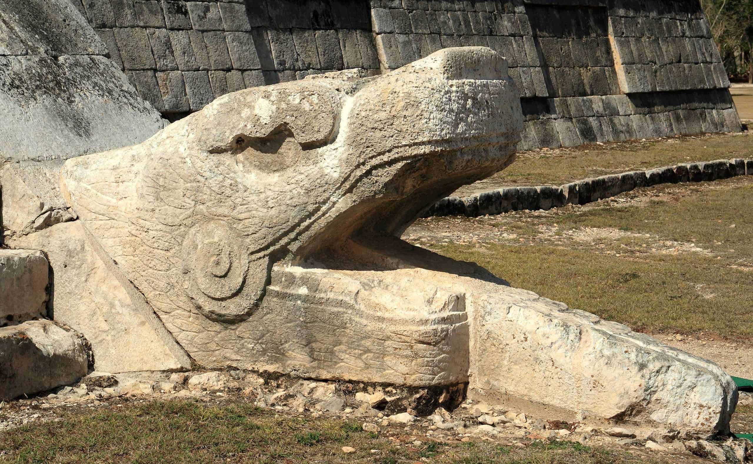 Serpent head at the base of El Castillo