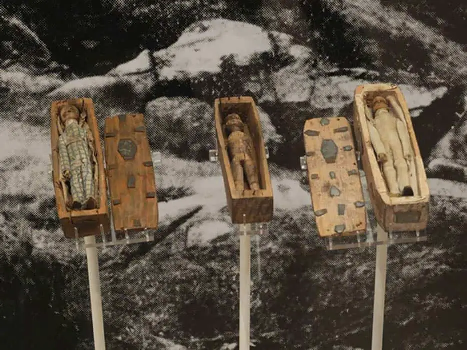 Three of the miniature coffins