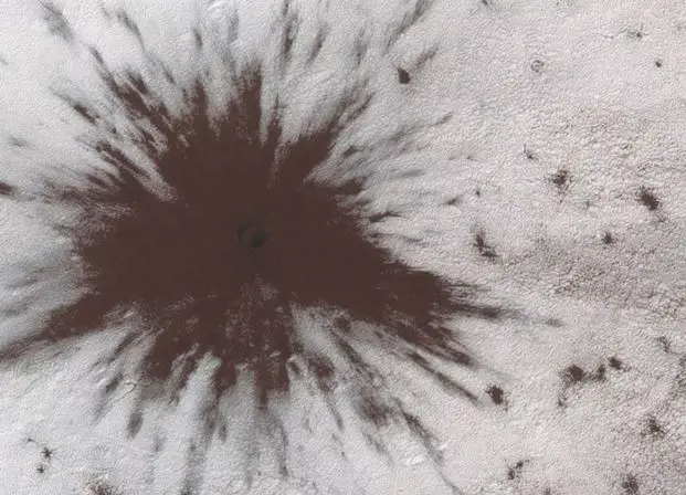 Something So Big Collided Against Mars, It Smashed Through Mars’ Ice Cap, And NASA Has Images